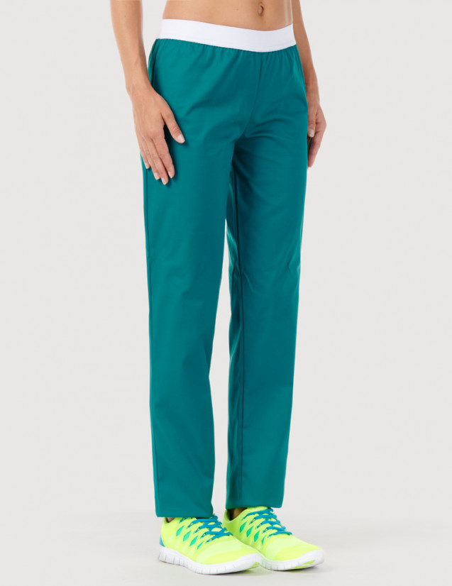 Pantalon médical élastiqué pour femme. Couleur bleu canard, vue 3/4 face - modèle Emma by Belissa